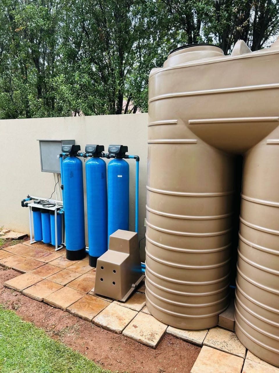 Professional plumber repairing a leaking pipe - Lovemores Plumbing