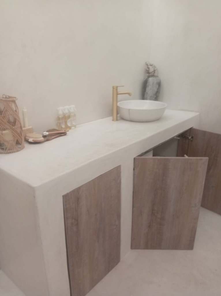 Under-counter precision plumbing, waste traps and custom joinery