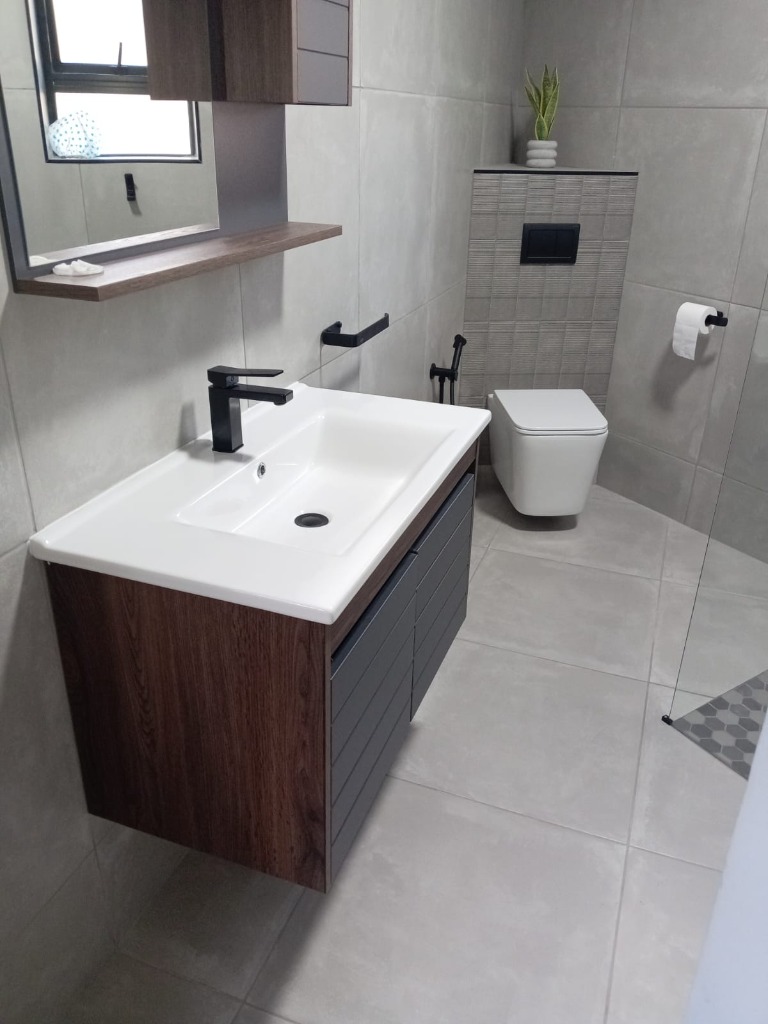 Double basin vanity installation in Douglasdale