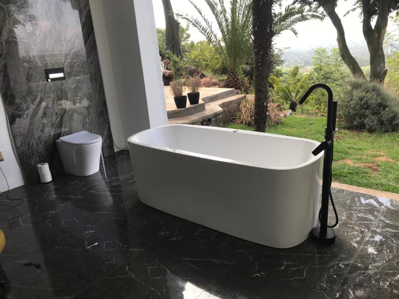 Designer vanity basin with matte black mixer